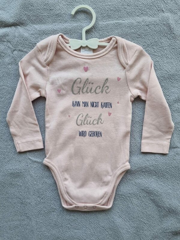 Babybody „Glück kann man nicht kaufen“